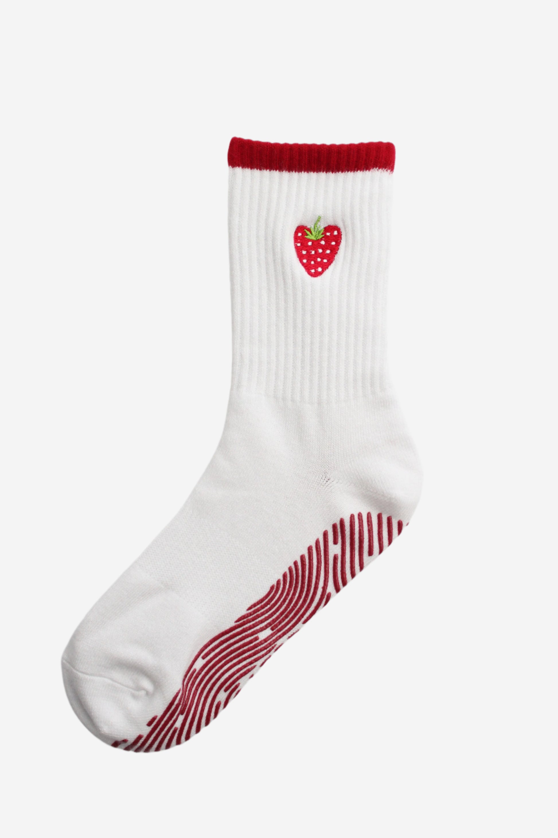 White sock with red strawberry design on a white background