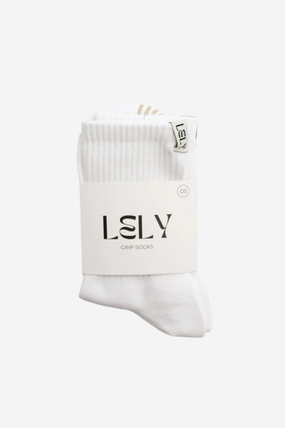 White crew grip socks with beige grips and Lely woven tag