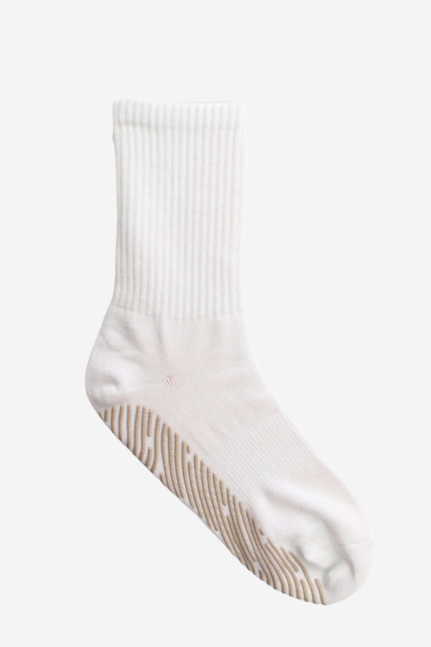 White sock with beige grips