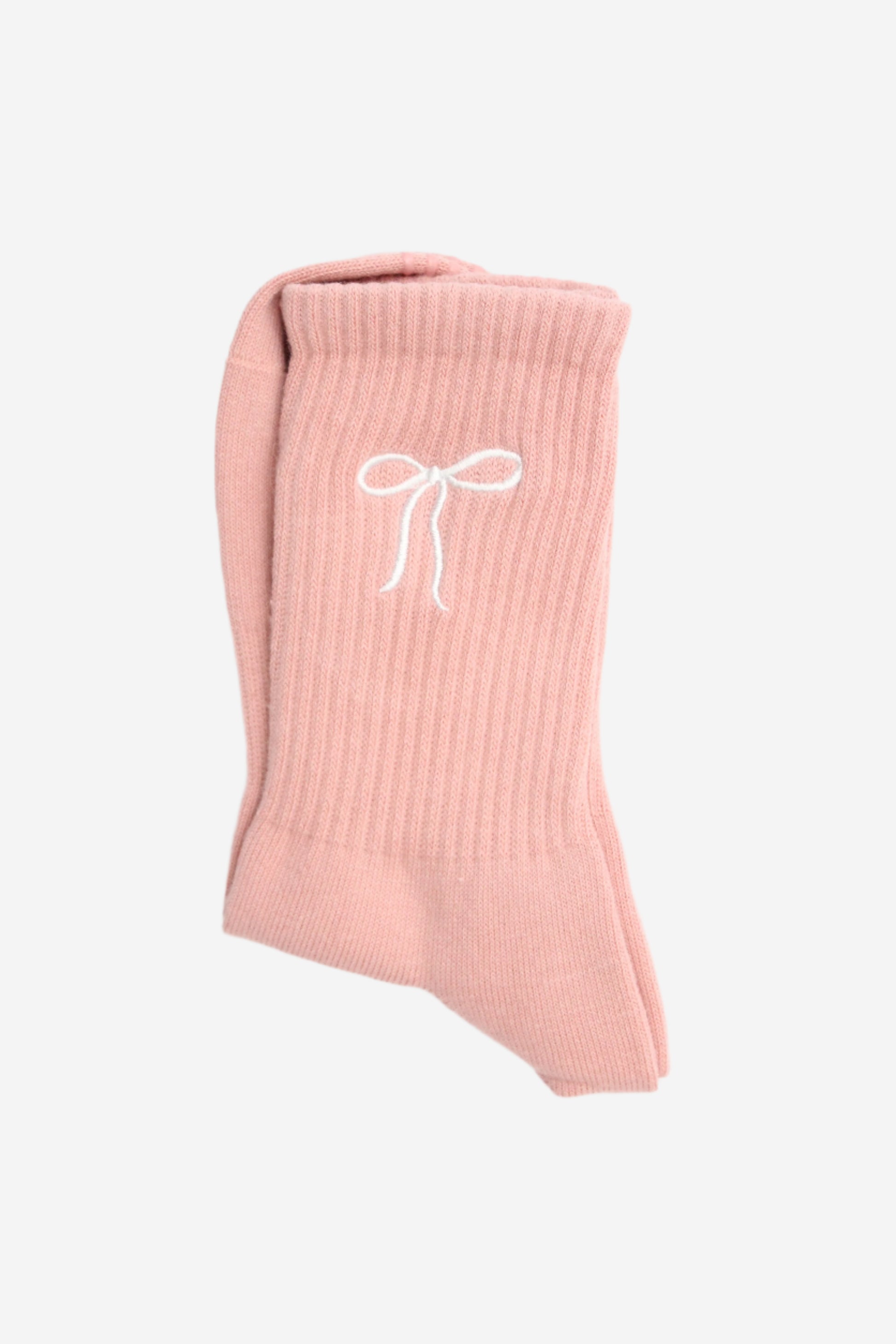 Pink ribbed sock with a white bow design