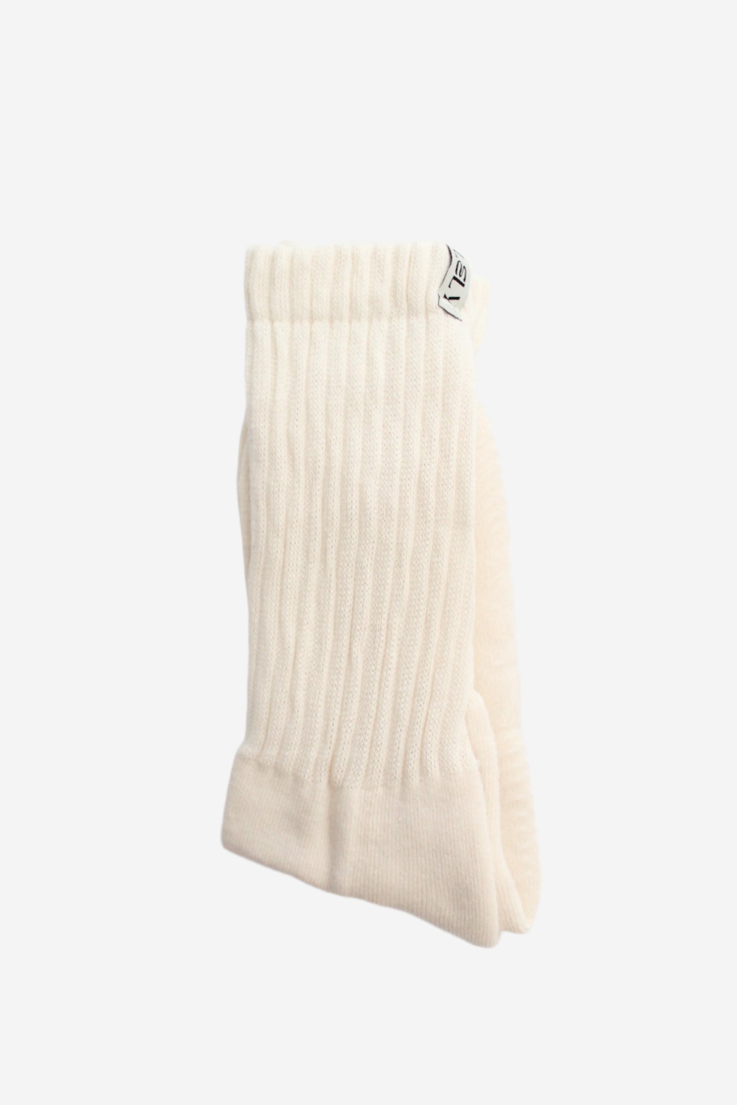 Beige slouch knit sock on a white background