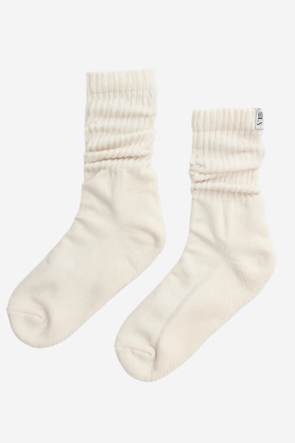 Pair of cream-coloured slouch knit socks