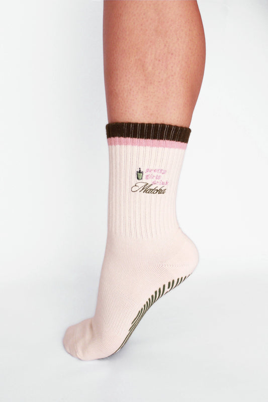 White sock with brown top and text on a white background